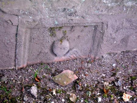 Gravestone in wall